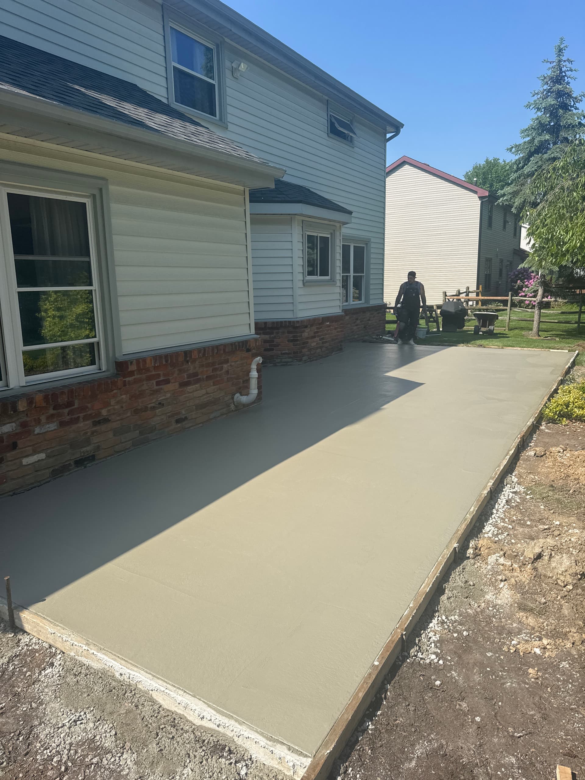 Fresh Concrete Patio Slab Poured and Ready to Last image
