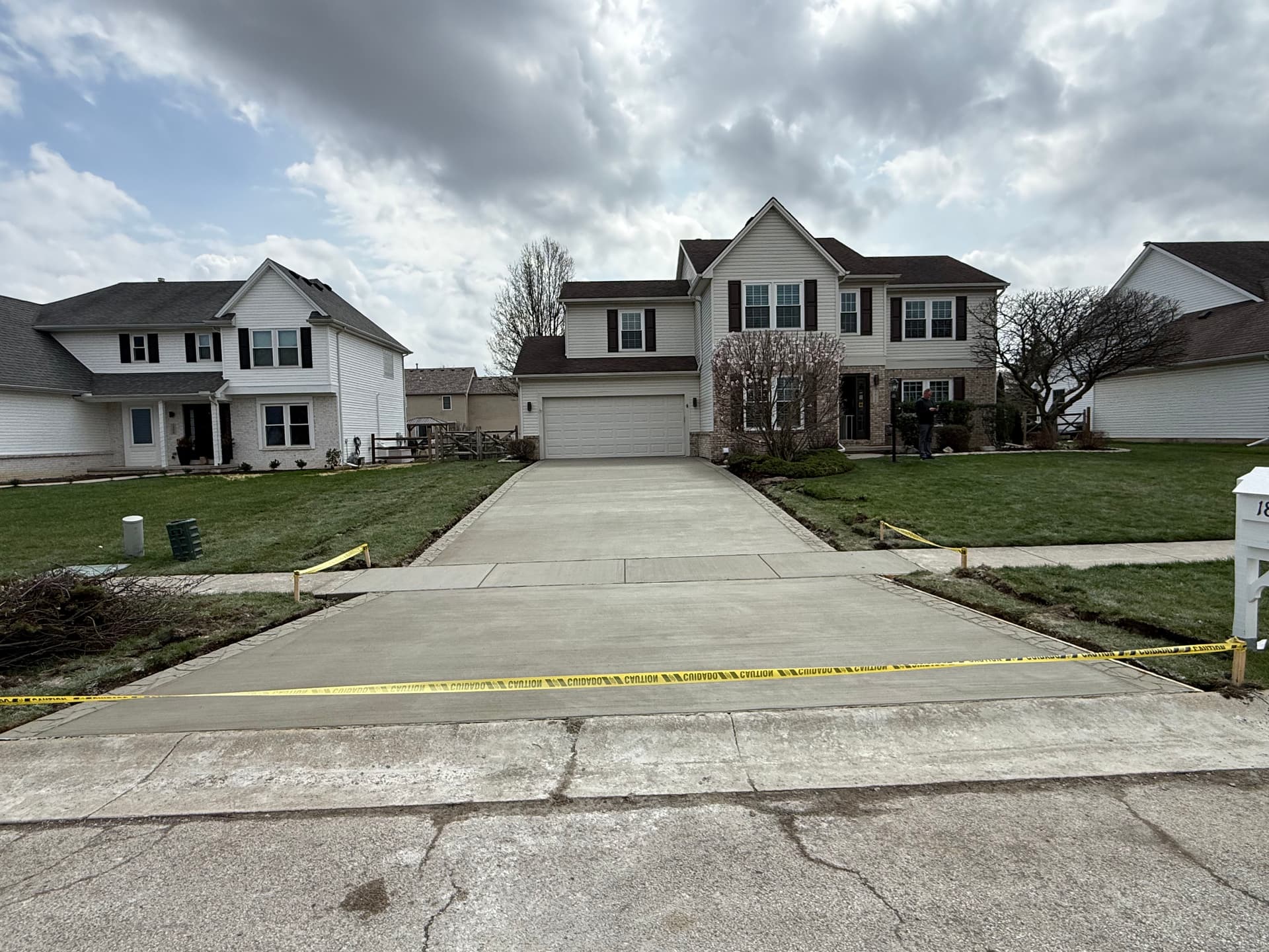 Fresh Concrete Driveway with a Stamped Border That Actually Pops image